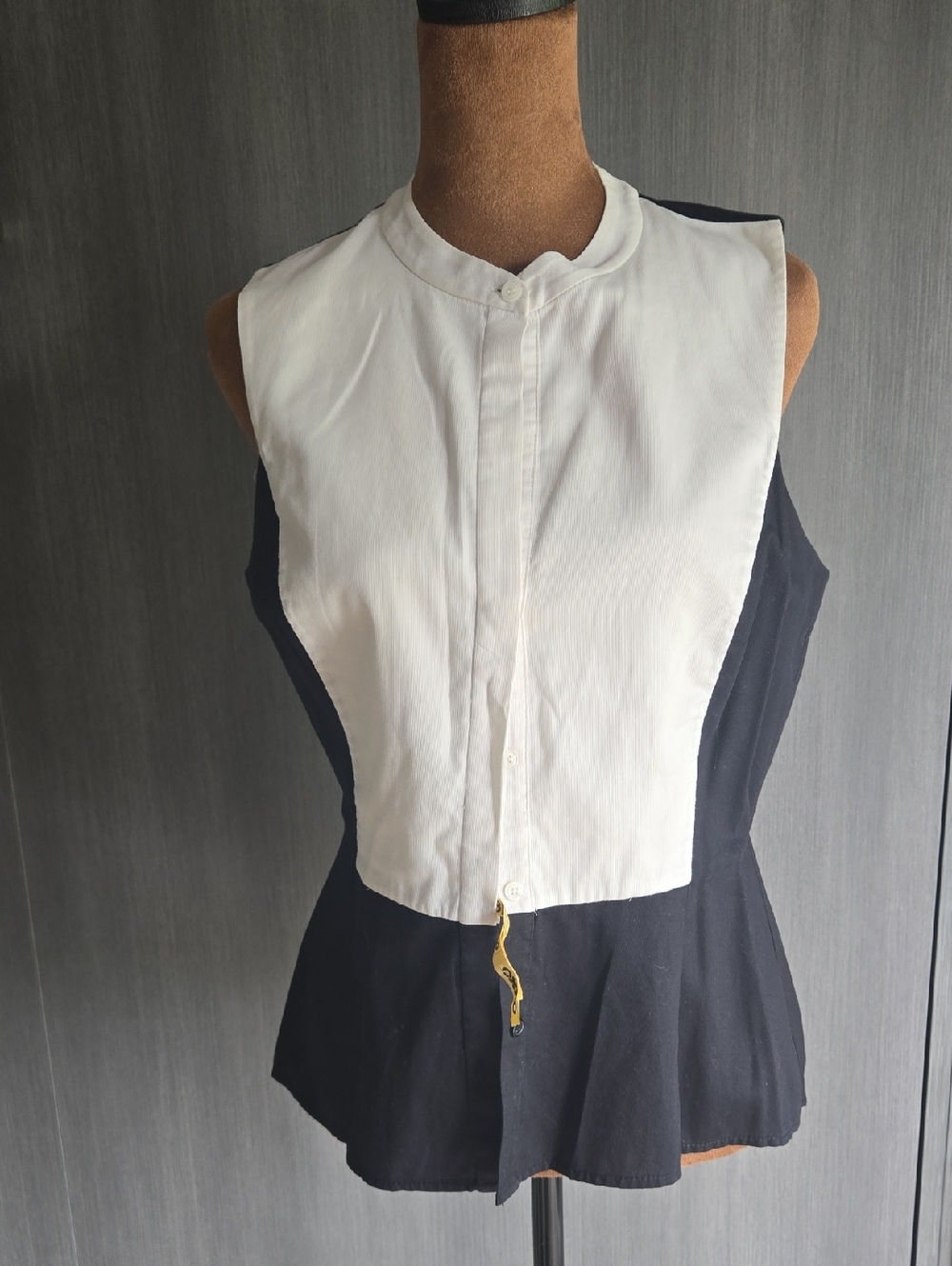 BCBGMaxAzria Sleeveless Two-Tone Peplum Blouse in White and Black